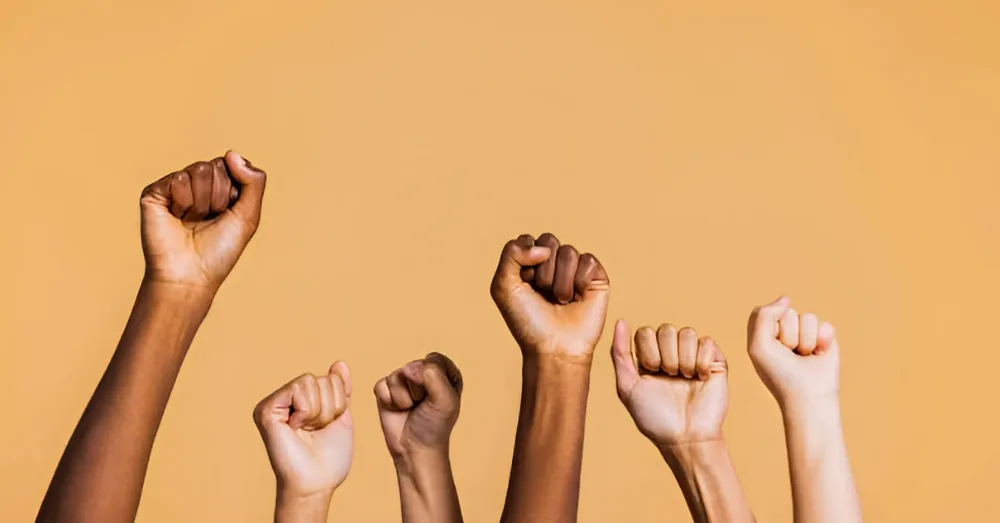 Six fists in the air