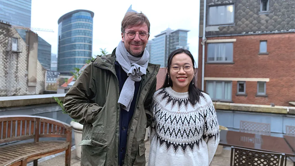 Kevin and Riley on a rooftop