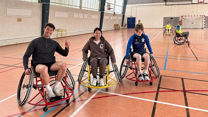 Three students in wheelchairs