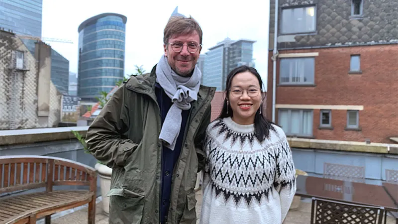 Kevin and Riley on a rooftop