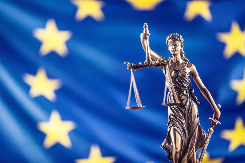 Lady Justice and European Union flag
