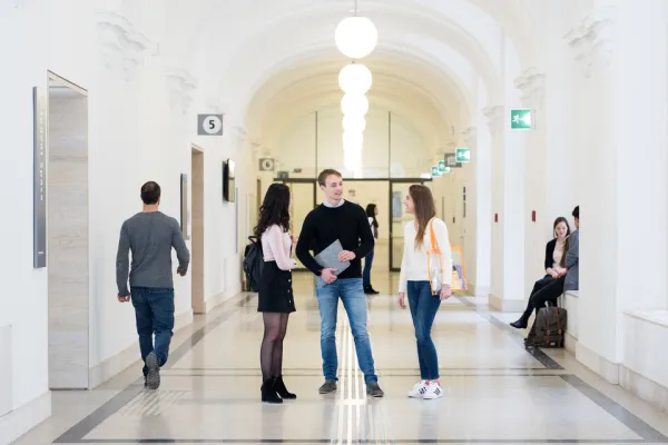 Three students talking