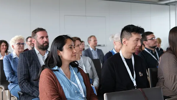 Colleagues listening to a presentation