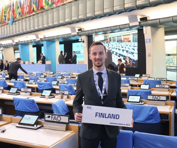 Paul Aguado representing Finland